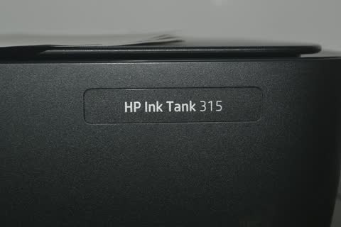 A close up of a hp ink tank
