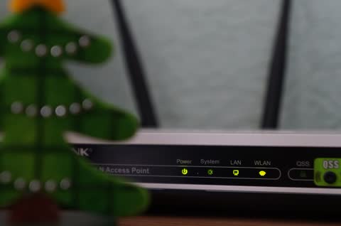 Wireless router with its status lights on