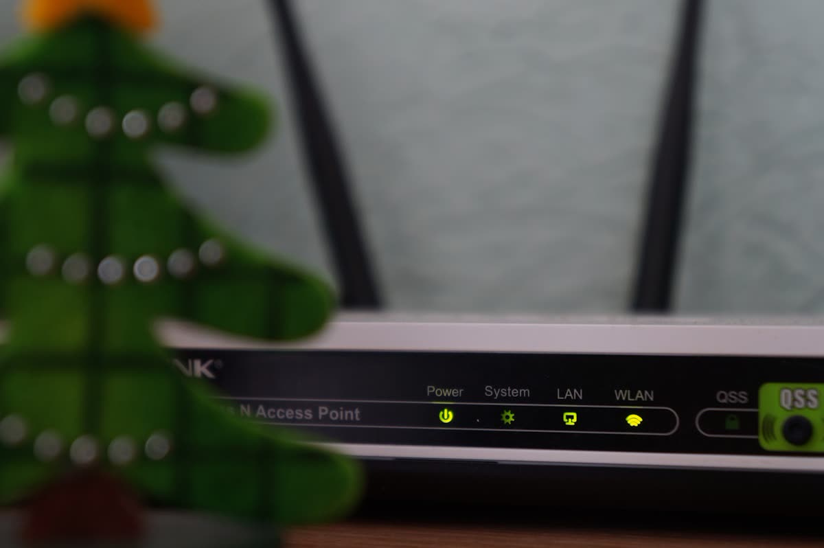 Wireless router with its status lights on