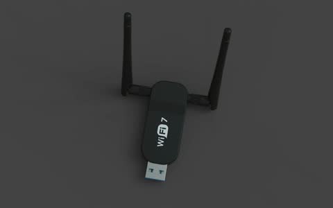 A black usb wifi 7 adapter with two antennas