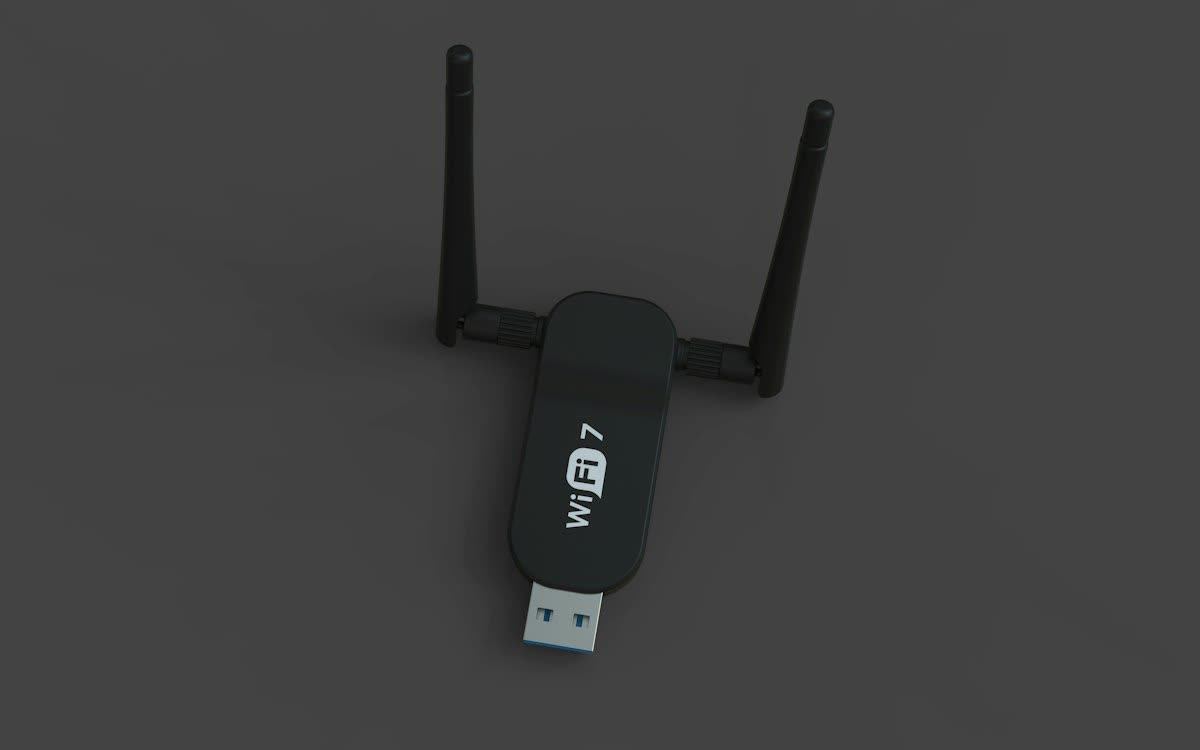 A black usb wifi 7 adapter with two antennas