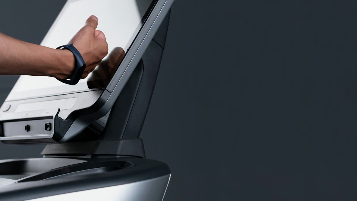 Hand lifting the lid of a flatbed scanner