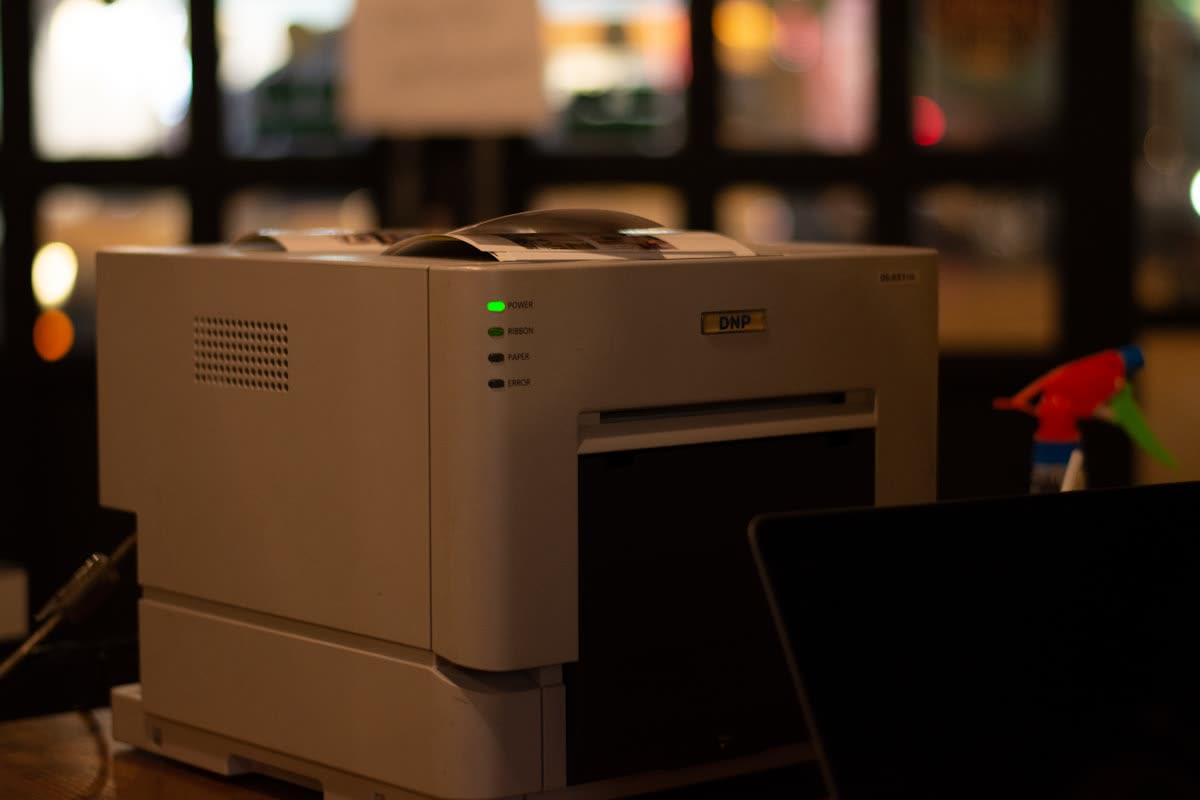 Compact printer in a dimly lit room