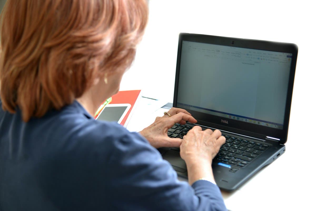 Person typing on a laptop