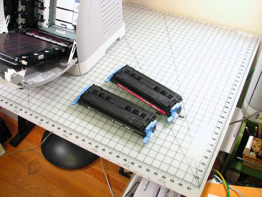 Toner cartridges removed from an HP Color LaserJet 2600n