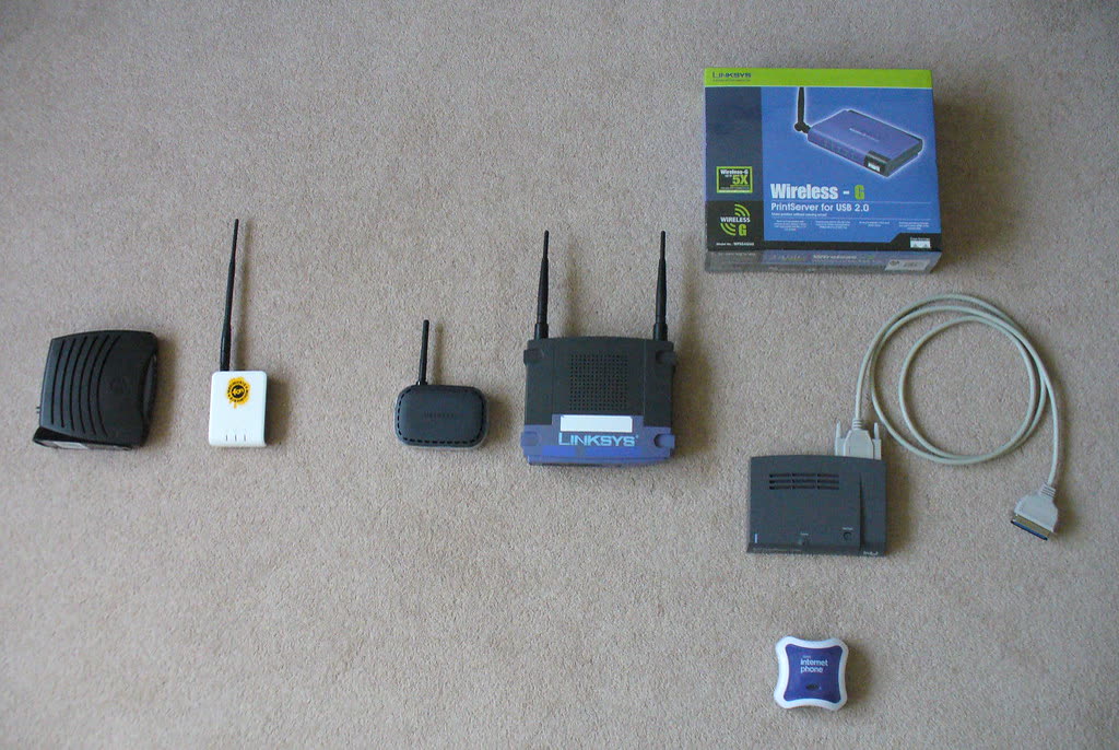 Home networking kit laid out: router, adapters and cables